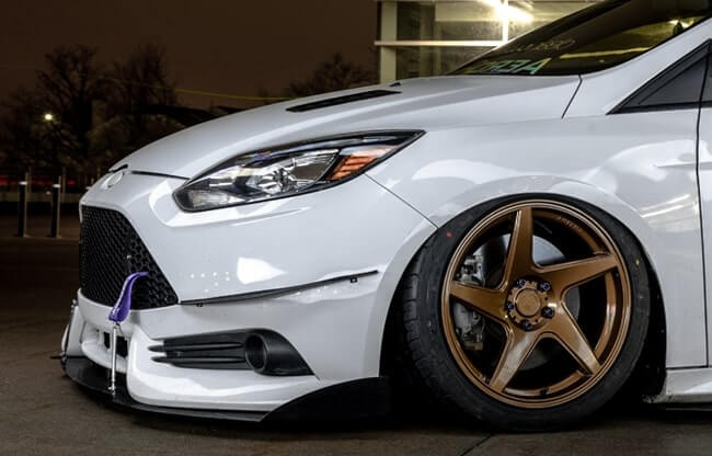 White 2014 Ford Focus ST with Rodin Bronze Anovia Kinetic Wheels