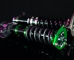 Green Fortune Auto Coilover next to a Silver BC Racing Coilover