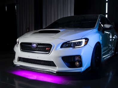 White 2017 Subaru STI with Picasa Blue Anovia Night Wheels and Purple Underglow
